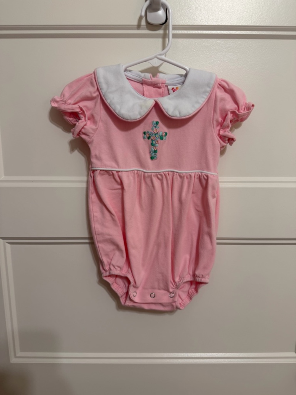 Pink Peter Pan Collar Infant One-Piece with Cross Appliqué